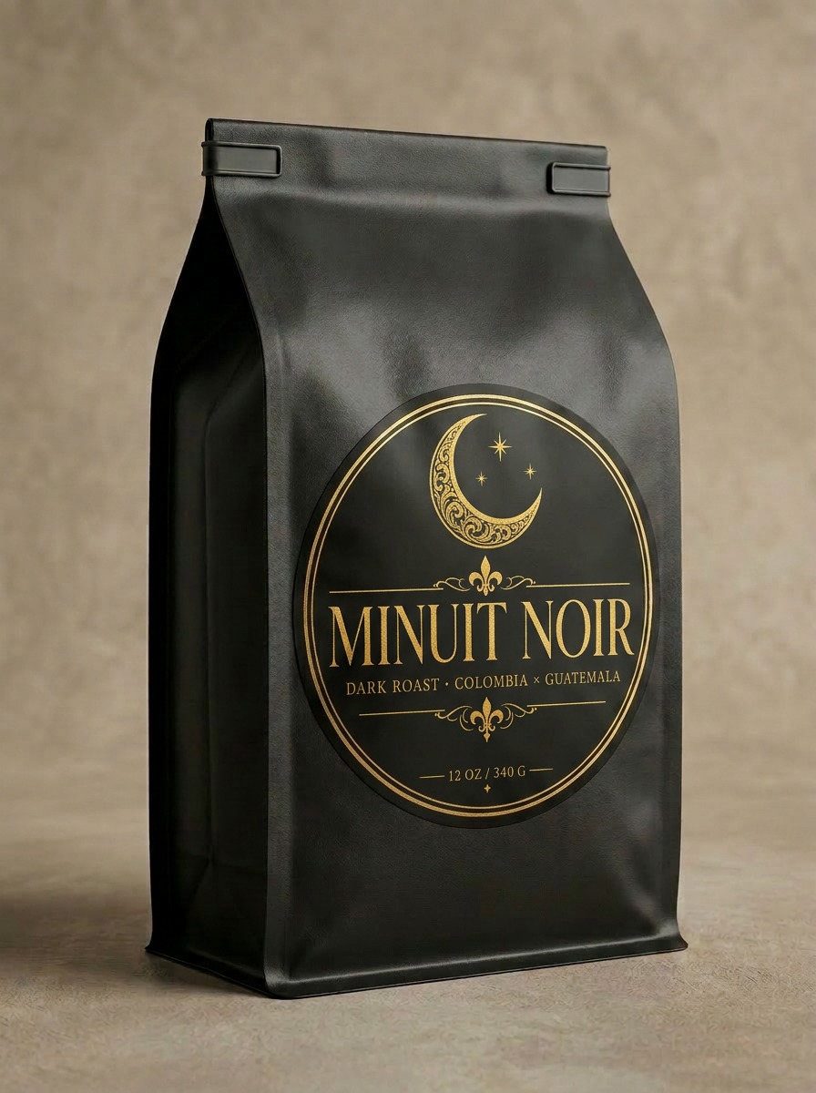Minuit Noir — Dark Roast coffee bag in matte black with gold D La Coffee monogram